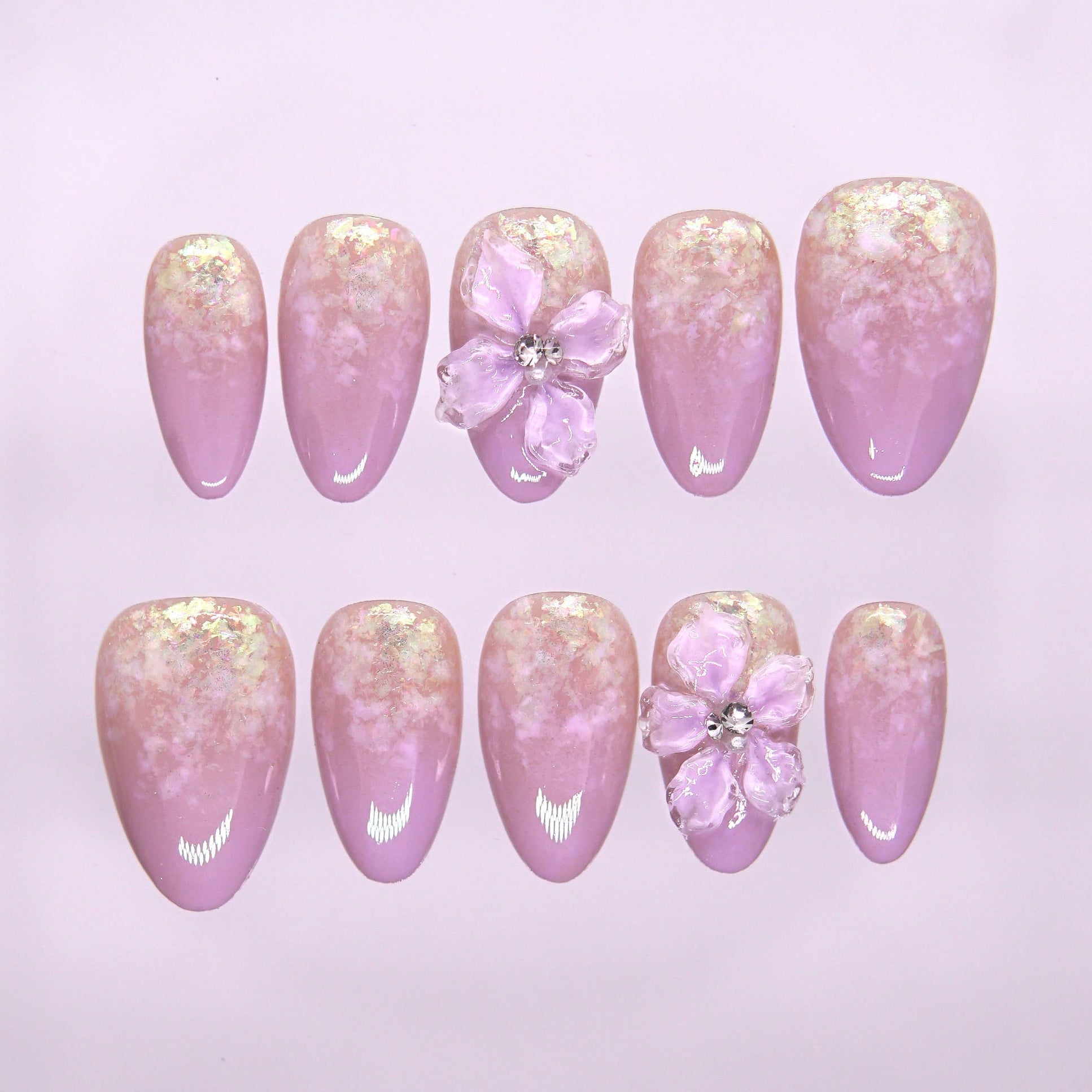 Dreamy lavender press-on nails with ombré shimmer and floral 3D accents from Blooming Hour Series.