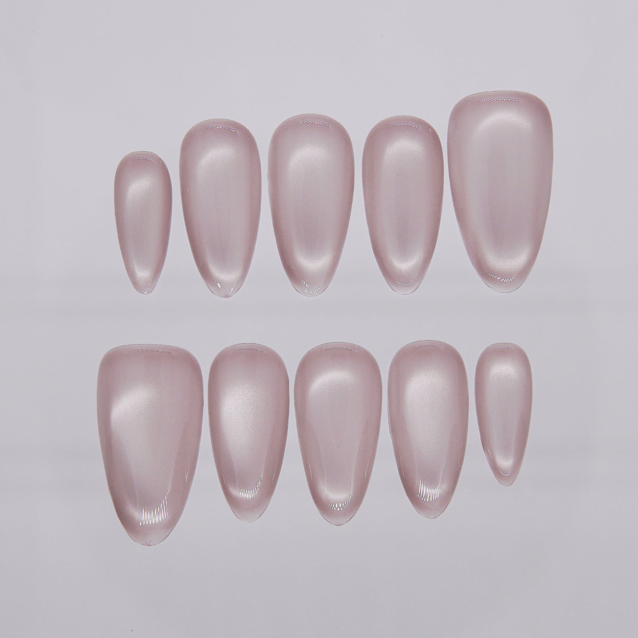 Muted mauve cat eye press-on nails with soft shimmer from Art By Cloe