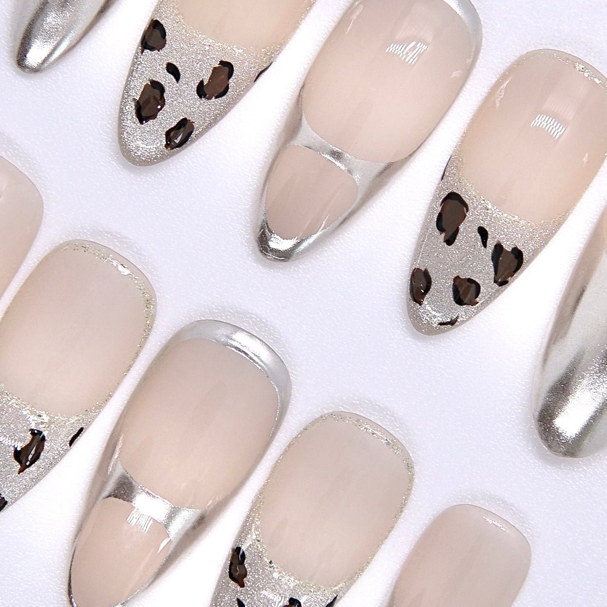 medium almond neutral base press-on nails with high-shine silver finish
